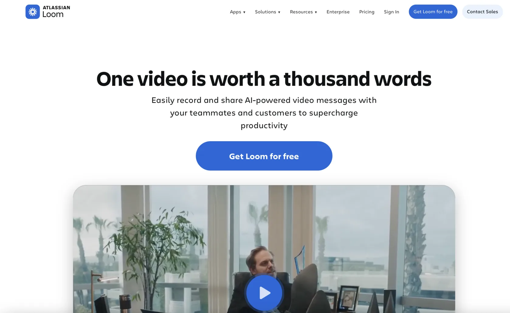 The Loom homepage: the headline “One video is worth a thousand words” above a Get Loom for free button, with a video of someone recording a message playing underneath.